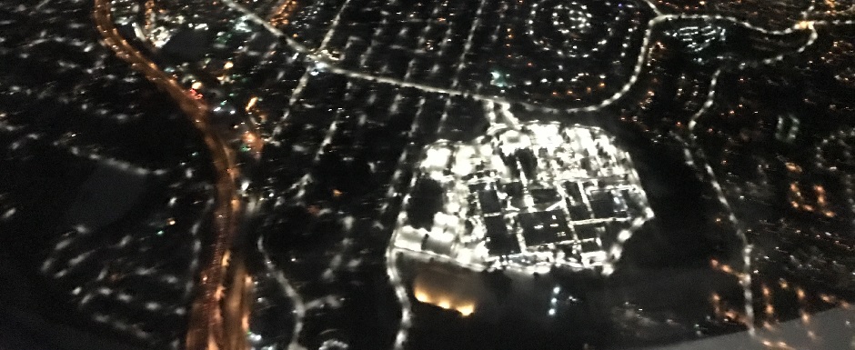 Snow Covered City at Night from a Plane Snow Covered City at Night from a Plane